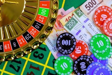 two-hundred-forty-five app home screen showing Free Fire esports and blackjack casino game tabs side by side
